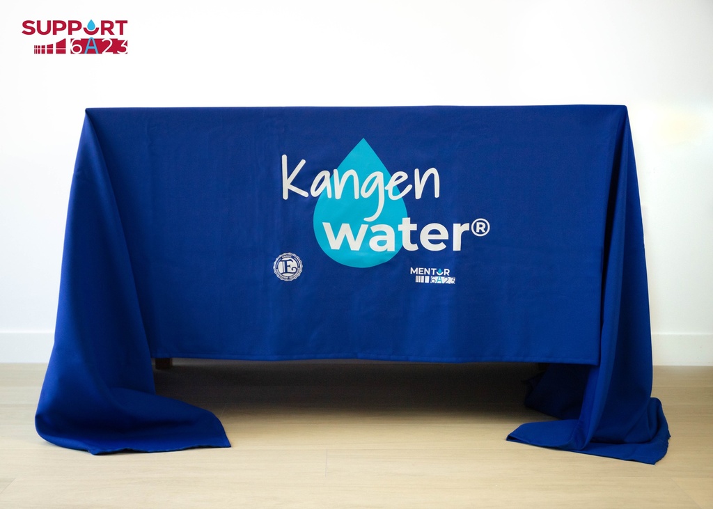 Mantel de tela azul con logo serigrafiado Kangen Water.